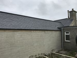Outbuilding converted and new slate roof fitted.
